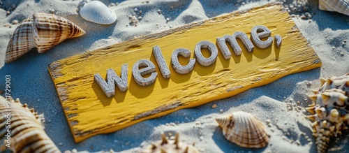 Blank yellow beach sign featuring a sand texture seashells the word welcome the sun and sandals. with copy space image. Place for adding text or design photo