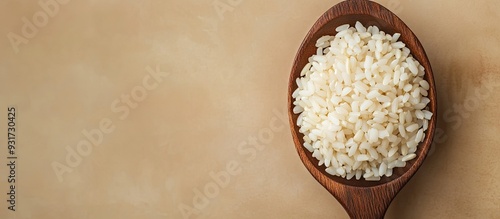 jasmine rice on a wooden sp...