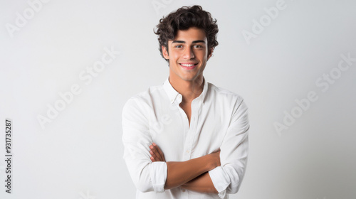 young indian man smiling on white background