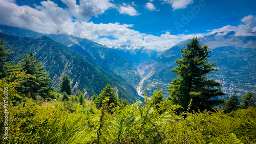 mountains green valley with blue sky and clouds