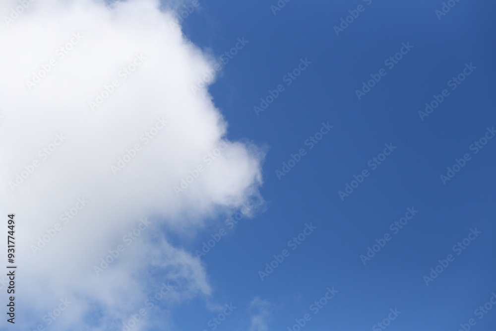 Blue sky with white clouds in the daytime background. Blue sky with white clouds in the daytime background.
