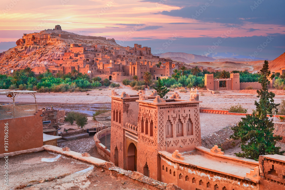 Ait-Benhaddou, Morocco. Medieval clay fortified city in North Africa, Atlas Mountain range in the background.