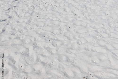 Fine white sand that glistens and reflects the sunlight.