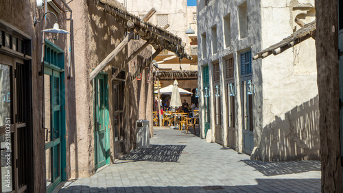 Street of Dubai old city or town or old village Al Seef Khor in Al Fahidi neighborhood, United Arab Emirates photo