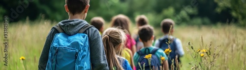 Group of children hiking in a field with backpacks, enjoying nature, adventure, and outdoor activities on a sunny day.