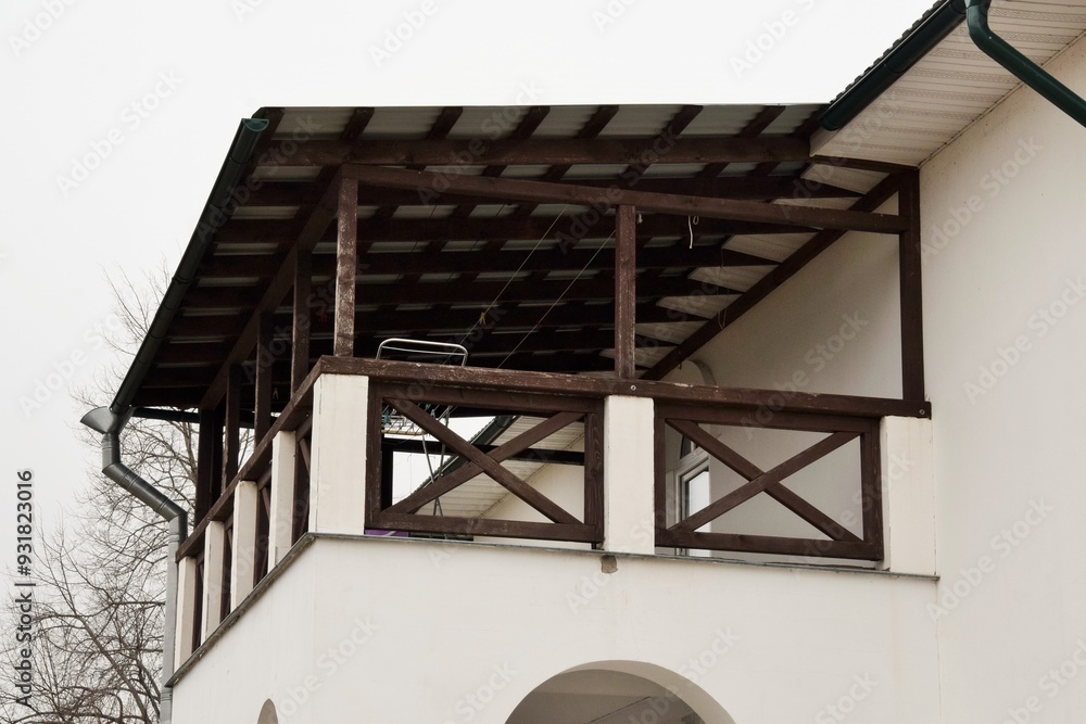 Obraz premium Architecture. Wide terrace framed by wood in a country house