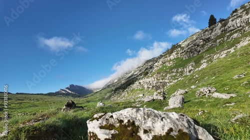 Timelapse of clouds in a mountain valley in summer