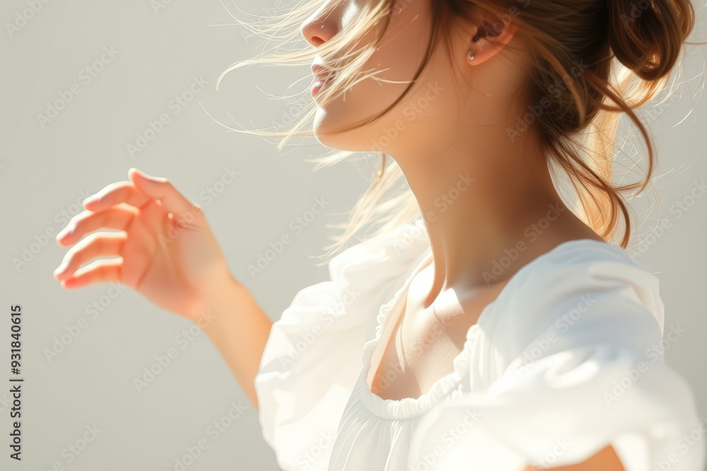 Woman in White Dress with Wind Blowing Through Her Hair Woman in White Dress with Wind Blowing Through Her Hair