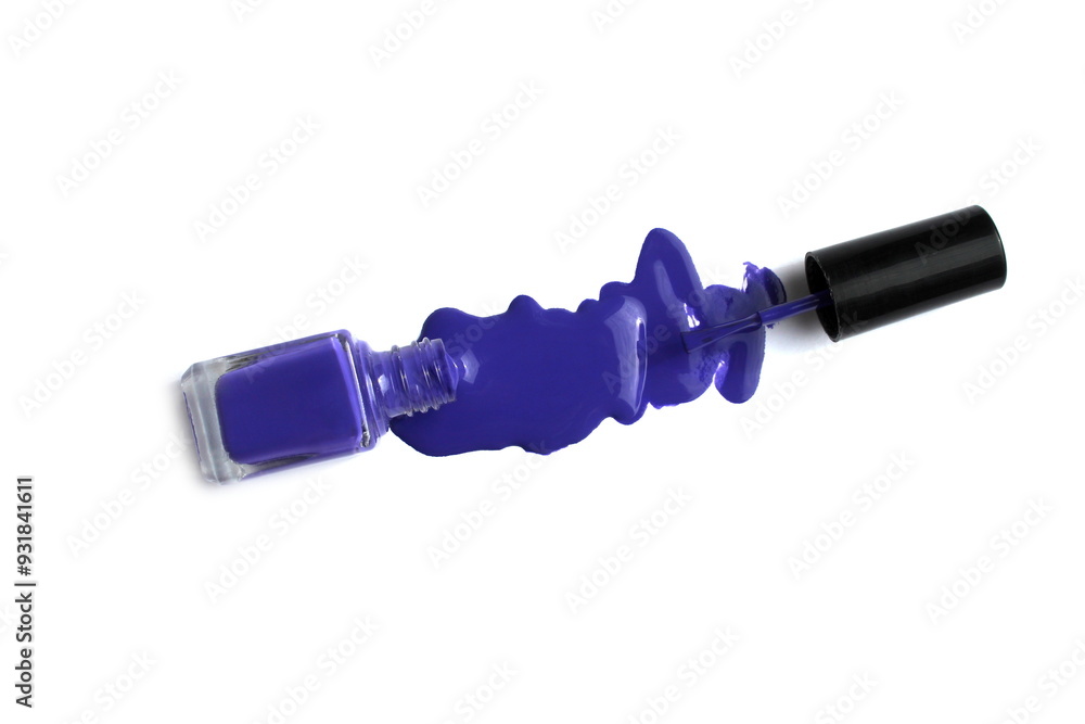 Blue varnish spilled with a brush lies on a white background. Blue varnish spilled with a brush lies on a white background.