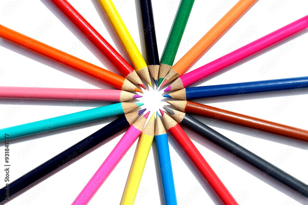 Colored pencils stacked in a circle on a white background Colored pencils stacked in a circle on a white background