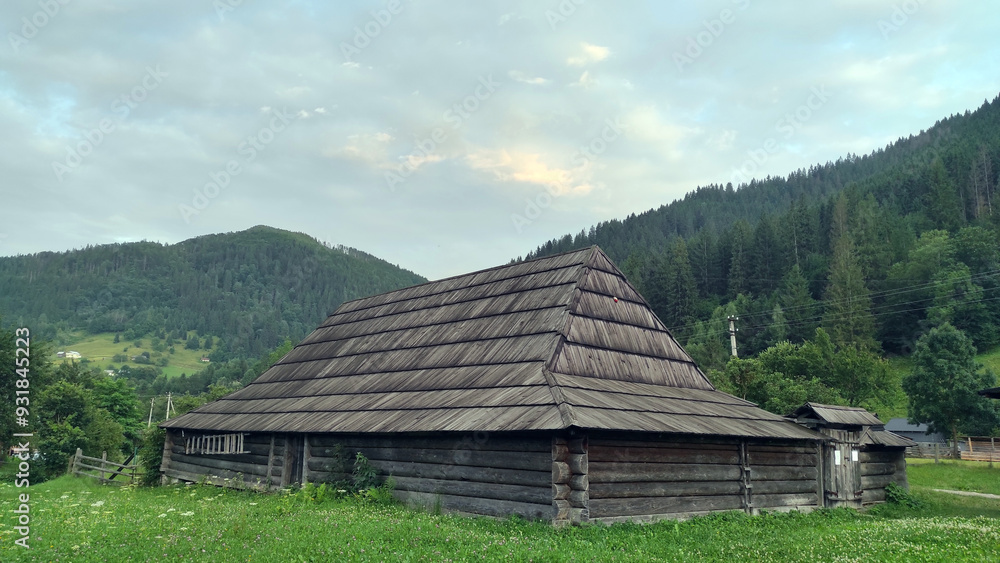 old wooden house against the backdrop of mountains old wooden house against the backdrop of mountains