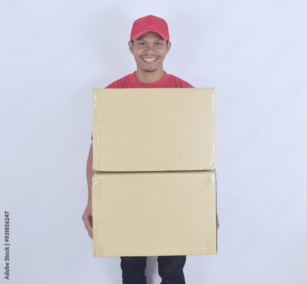 Delivery concept. Delivery man holding boxes on white background. Delivery concept. Delivery man holding boxes on white background.