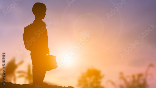 A boy with school backpack go to school