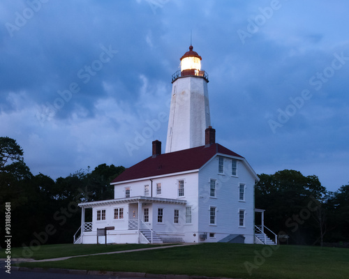 Sandy Hook Lighthouse is seen during twilight in August of 2024 photo