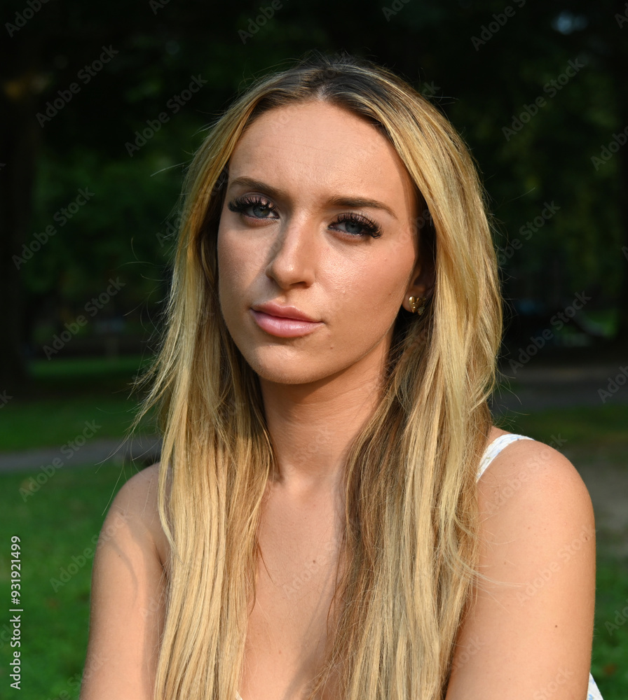 Naklejka premium beautiful young woman portrait outside