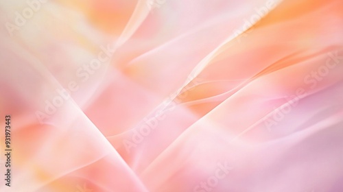 Abstract blur of pastel peach and pink hues creating a warm toned backdrop ideal for design projects such as banners or slideshows