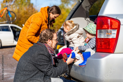Happy family getting ready for a day out