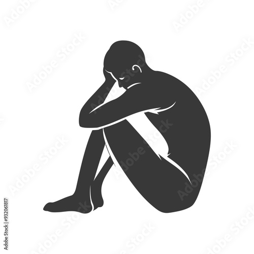 Silhouette of a person sitting with their head in their hands