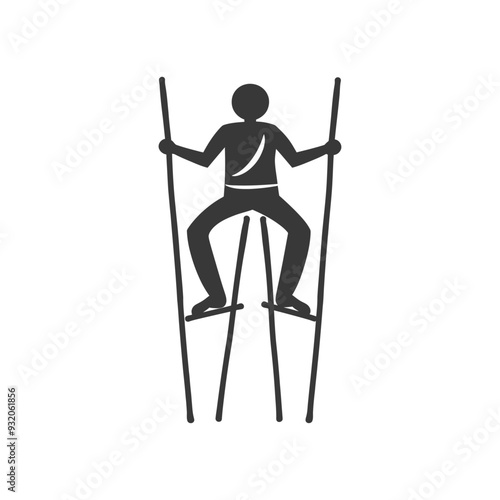 Silhouette of a Person Walking on Stilts