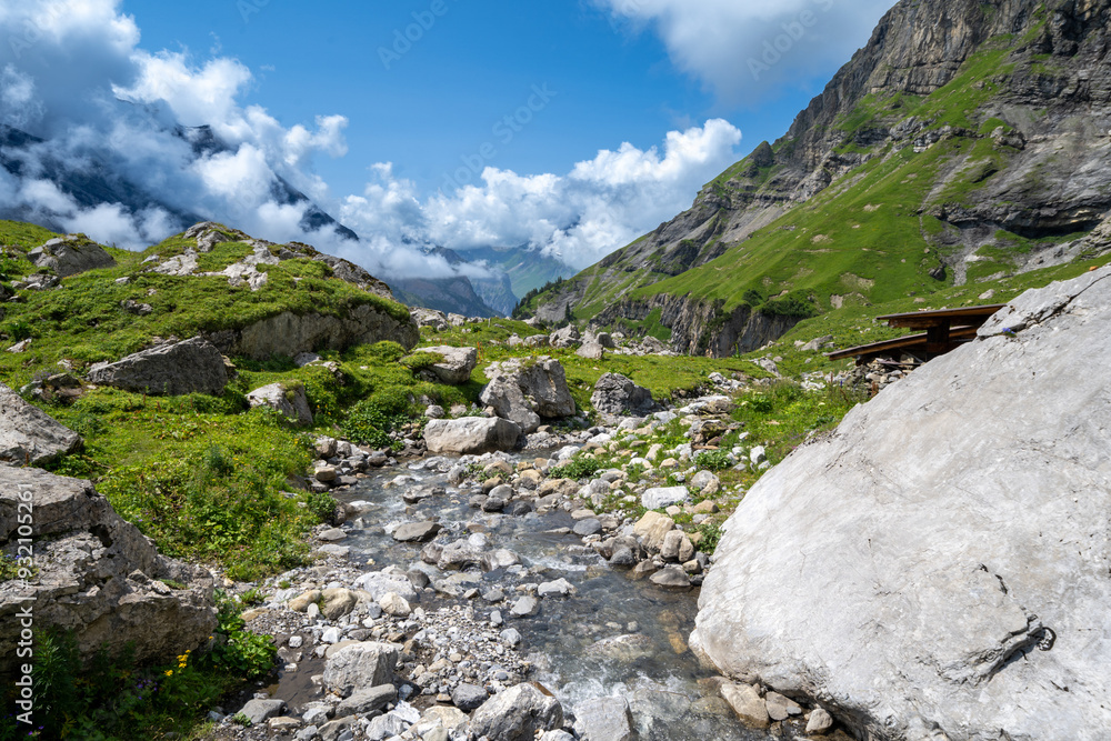 Hiking trail along the Oeschinensee Lake hike in Switzerland