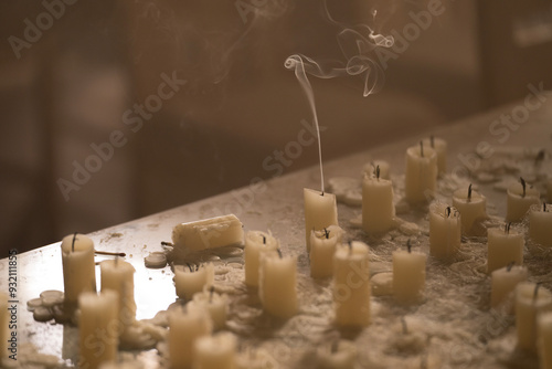 Last  of several candles snuffed out