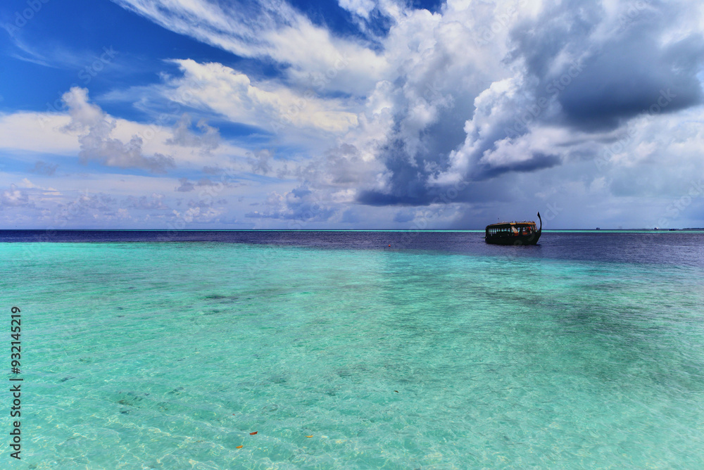 Boat anchored in the Indian Ocean, Mauritius Boat anchored in the Indian Ocean, Mauritius