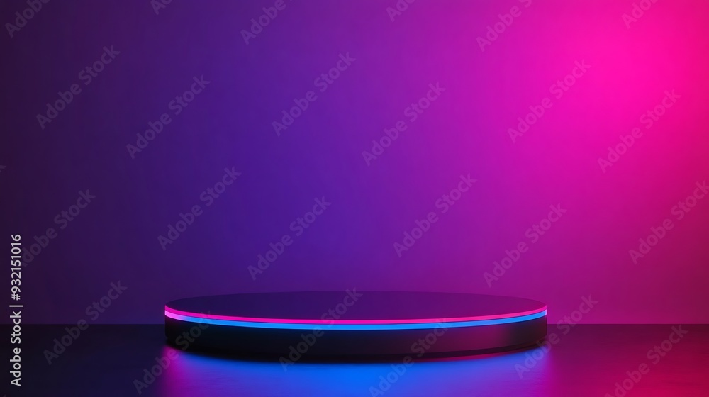 A black podium with neon pink and blue light on a dark background. A black podium with neon pink and blue light on a dark background.
