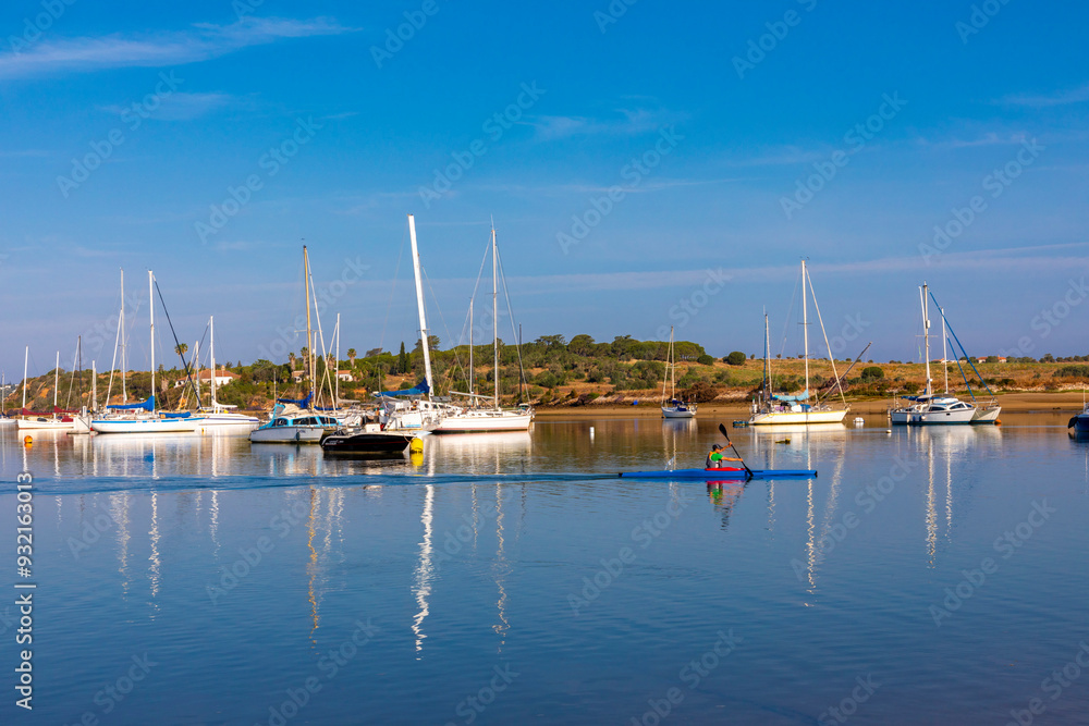 Canoeist in Harbour at Alvor, Alvor, Algarve, Portugal, Iberian Peninsula, South Western Europe Canoeist in Harbour at Alvor, Alvor, Algarve, Portugal, Iberian Peninsula, South Western Europe