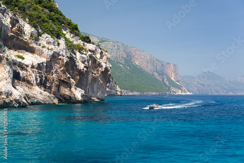 Speedboat heading towards Cala Mariolu, Gulf of Orosei National Park, Santa Maria Navarrese, Baunei, Nuoro, Sardinia, Italy, Mediterranean photo