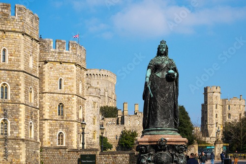 View of Queen Victoria bronze statue on Castle Hill and the castle beyond, Windsor, Berkshire, England, United Kingdom photo