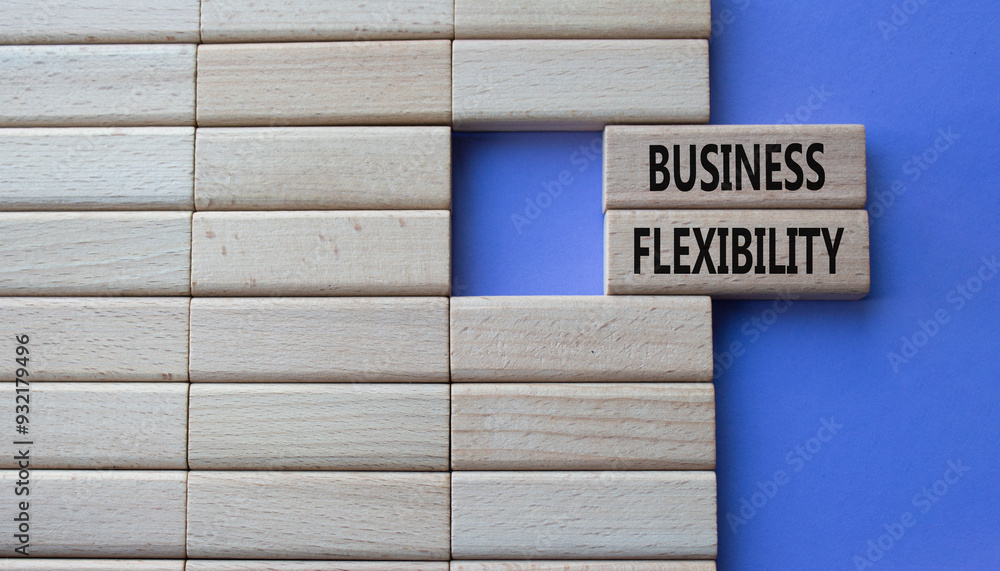 Business Flexibility symbol. Concept word Business Flexibility on wooden blocks. Beautiful purple background with boat. Business and Business Flexibility concept. Copy space Business Flexibility symbol. Concept word Business Flexibility on wooden blocks. Beautiful purple background with boat. Business and Business Flexibility concept. Copy space