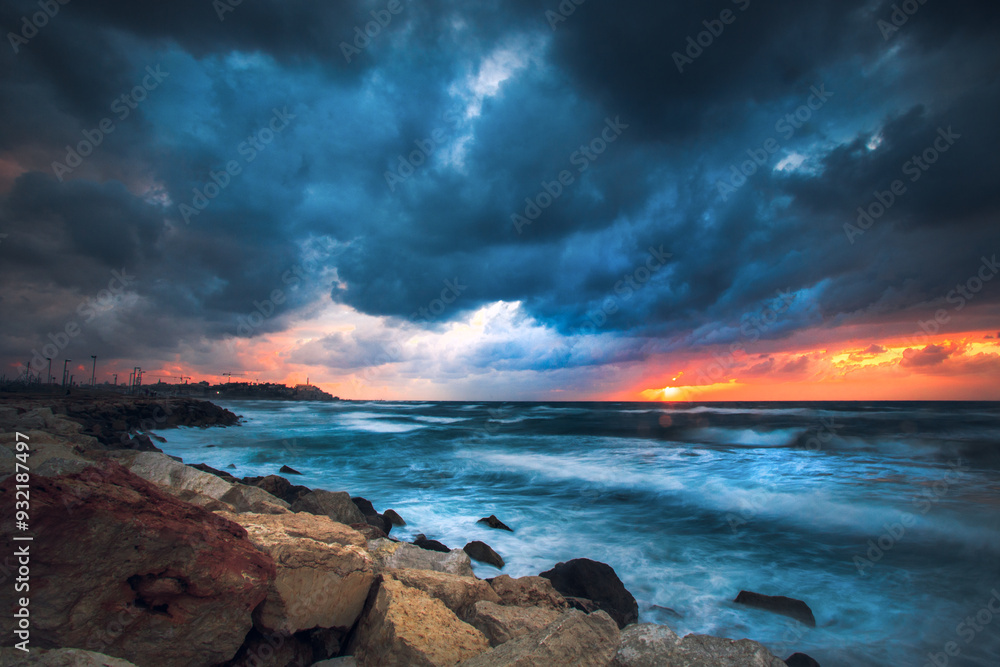 Dramatic grey storm clouds over the coast of Tel Aviv and Mediterranean Sea, Israel Dramatic grey storm clouds over the coast of Tel Aviv and Mediterranean Sea, Israel