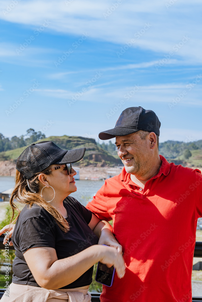 Happy couple smiling and in love. Latinos traveling in Colombia. People smiling. Happy couple smiling and in love. Latinos traveling in Colombia. People smiling.
