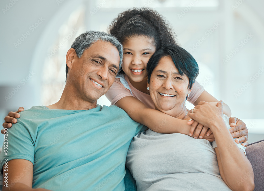 Obraz premium Grandparents, child and hug in portrait on couch with happiness, love and support in home. Family, care and smile together in living room, apartment or relax on sofa in house with senior couple