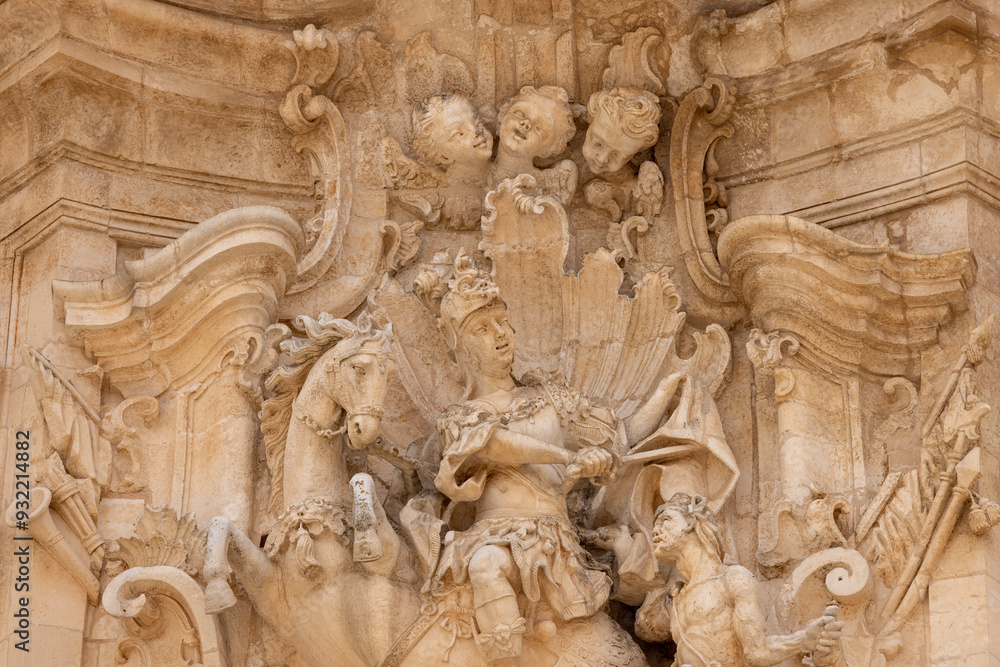 Facade of baroque Basilica of San Martino (Basilica di San Martino), located in Plebiscito Square, Martina Franca, Italy, Apulia
