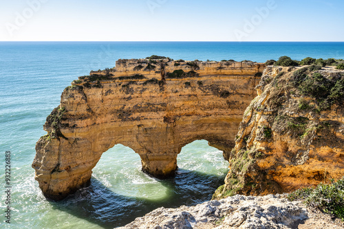 Praia da Marinha Beach among rock islets and cliffs seen from Seven Hanging Valleys Trail, Algarve, Portugal photo