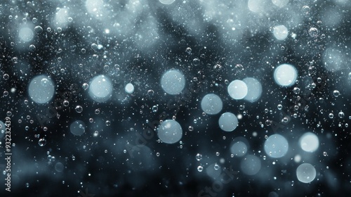 Glowing blue and white bokeh background with sparkling light effects