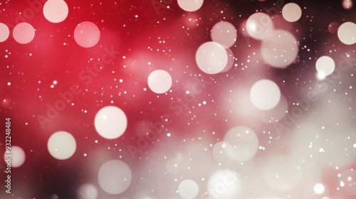 Delicate red and white bokeh lights create a festive atmosphere during a wint...