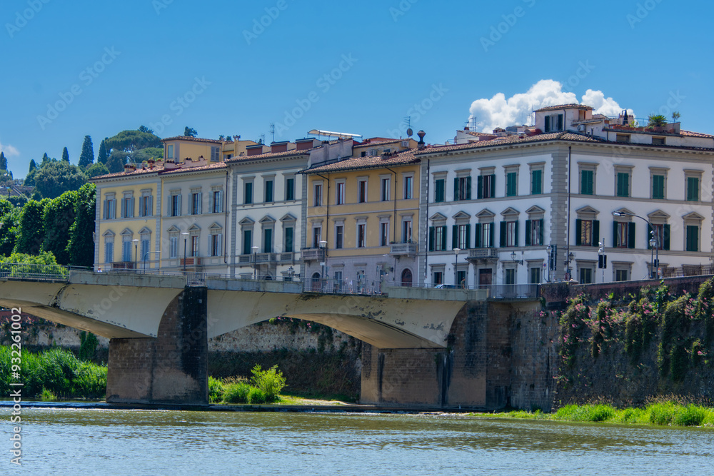View of the architecture of the beautiful city of Florence in Italy from the Arno River View of the architecture of the beautiful city of Florence in Italy from the Arno River