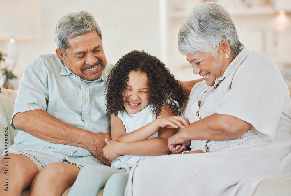 Fototapeta premium Happy, grandparents and tickling child in home for funny joke, playful and bonding on weekend. Family, house and game with girl on sofa for retirement, humor and laughter in connection together