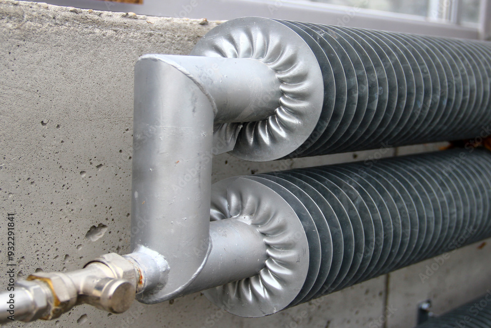 Metal heating pipes with round radiator fins Metal heating pipes with round radiator fins