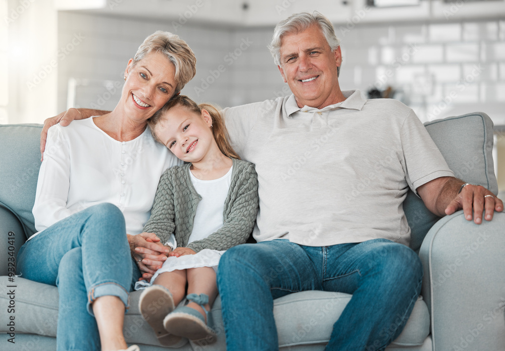 Happy, sofa and portrait of kid with grandparents in home for bonding, connection and family time. Smile, love and girl child relax with senior man and woman in living room at house in Australia. Happy, sofa and portrait of kid with grandparents in home for bonding, connection and family time. Smile, love and girl child relax with senior man and woman in living room at house in Australia.