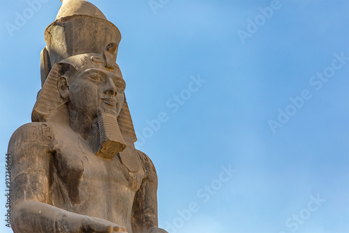 Canvas Print The colossal statue of Ramses II dominates the temple of Luxor, testimony to the power of the pharaoh and the greatness of ancient Thebes