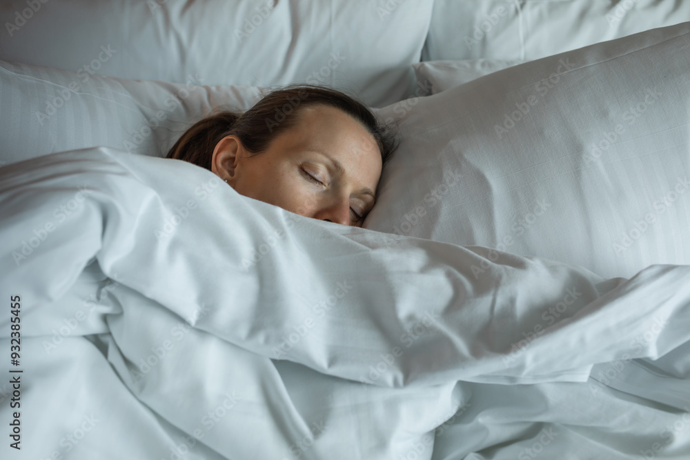 young woman sleeping in bed, person in a deep sleep young woman sleeping in bed, person in a deep sleep
