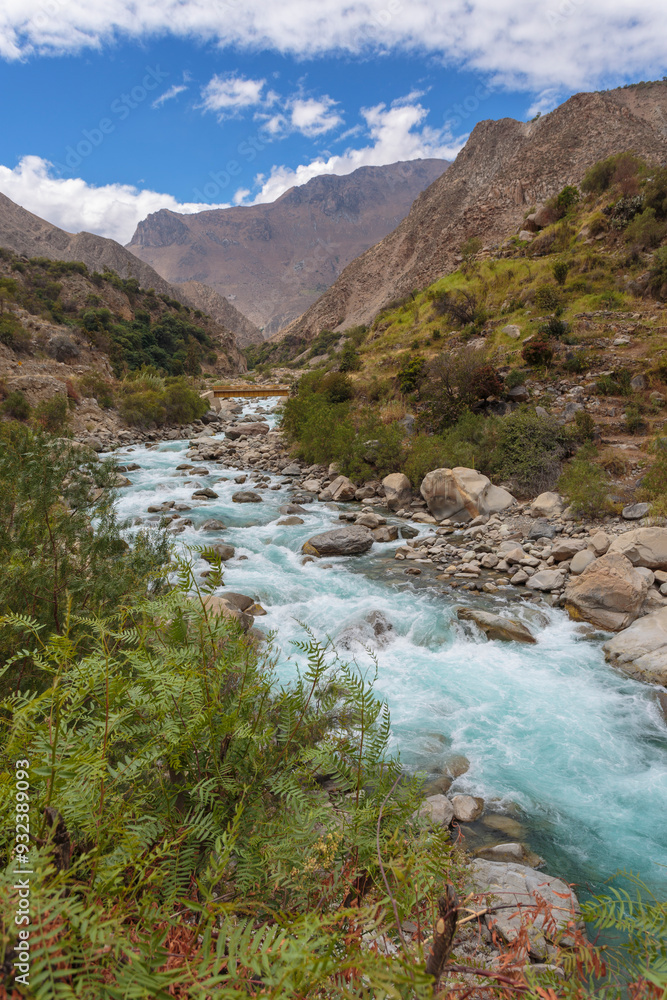 Flowing river with rocky surroundings view