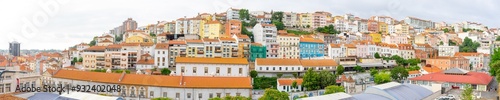 Wide panoramic view of the urbanized area of  the city of Coimbra-Portugal.