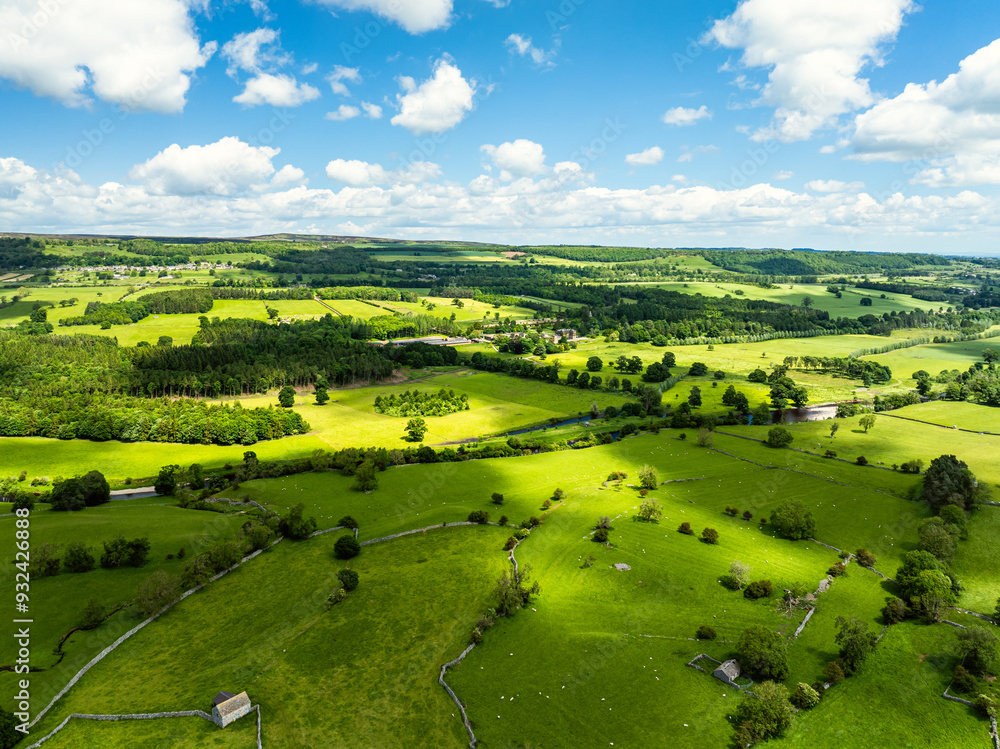 Farms and Fields over Bainbridge Village from a drone, Leyburn, North Yorkshire, England