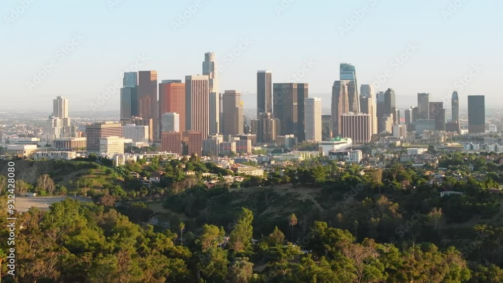 Downtown Los Angeles displays a captivating blend of modern skyscrapers and historic buildings, creating a picturesque contrast against a clear sky, especially when viewed from above Downtown Los Angeles displays a captivating blend of modern skyscrapers and historic buildings, creating a picturesque contrast against a clear sky, especially when viewed from above