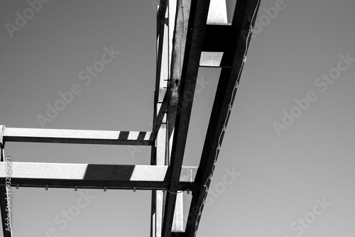 high contrast black and white metal bridge photo