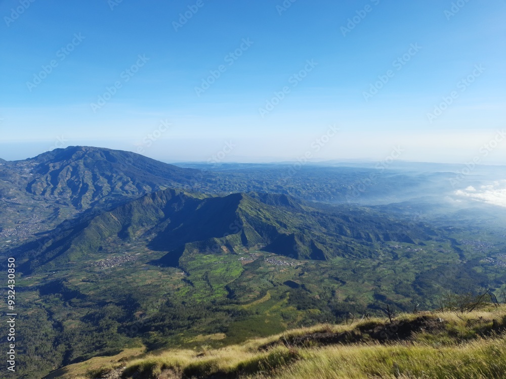 beautiful view of the hills photo taken from the top of the mountain. mountain landscape wallpaper beautiful view of the hills photo taken from the top of the mountain. mountain landscape wallpaper